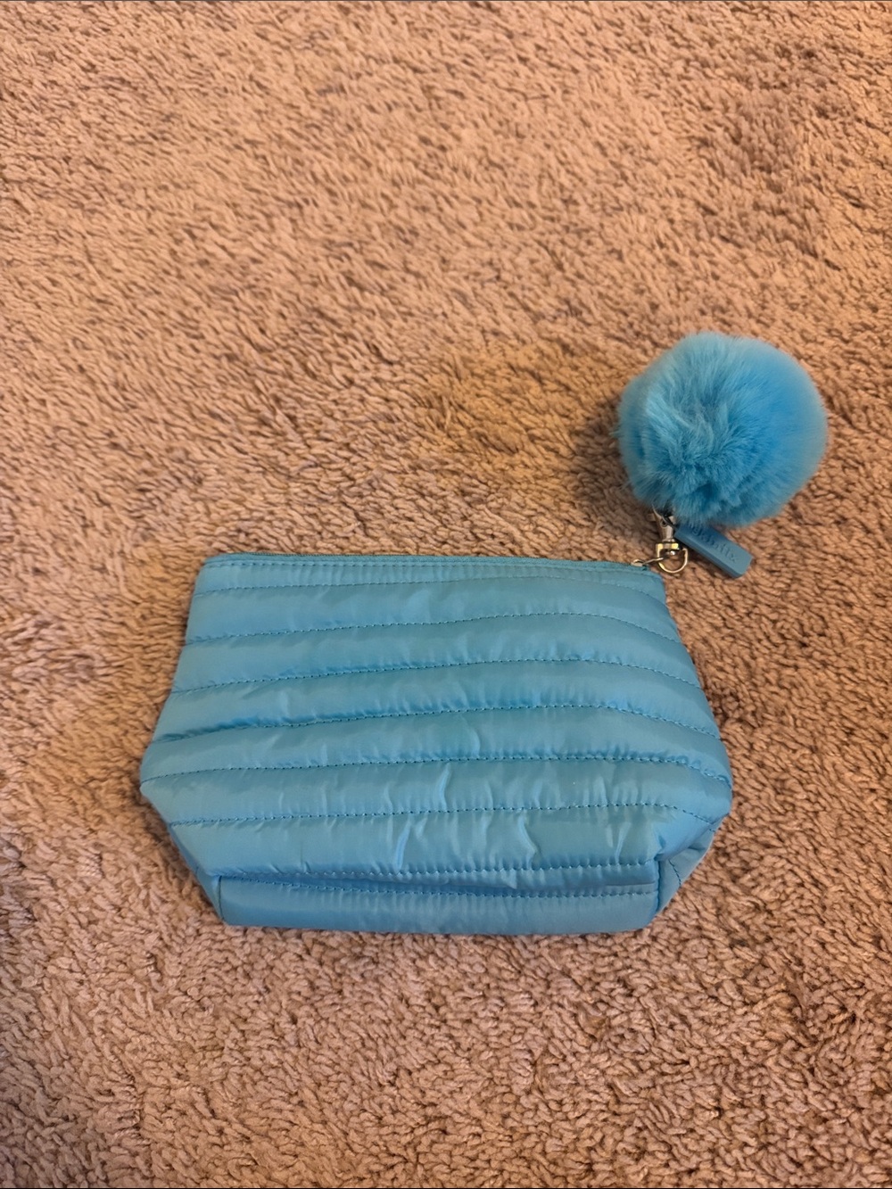 Blue Quilted Cosmetic Pouch with Pom Pom Charm